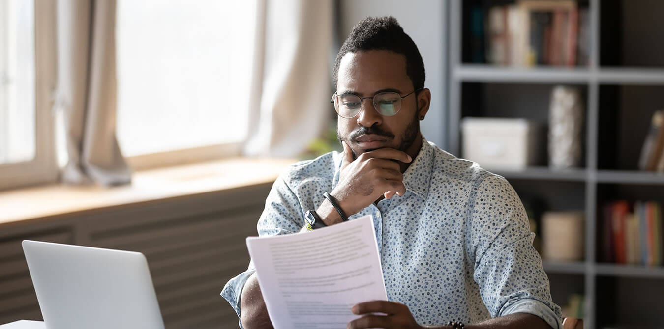 man reviewing mib insurance report