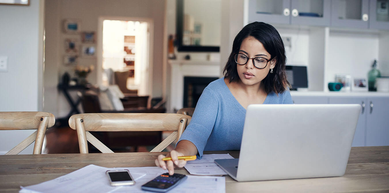 woman calculating life insurance needs