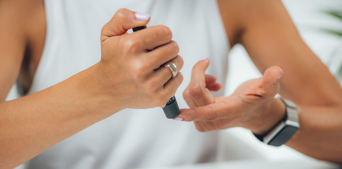 woman testing glucose